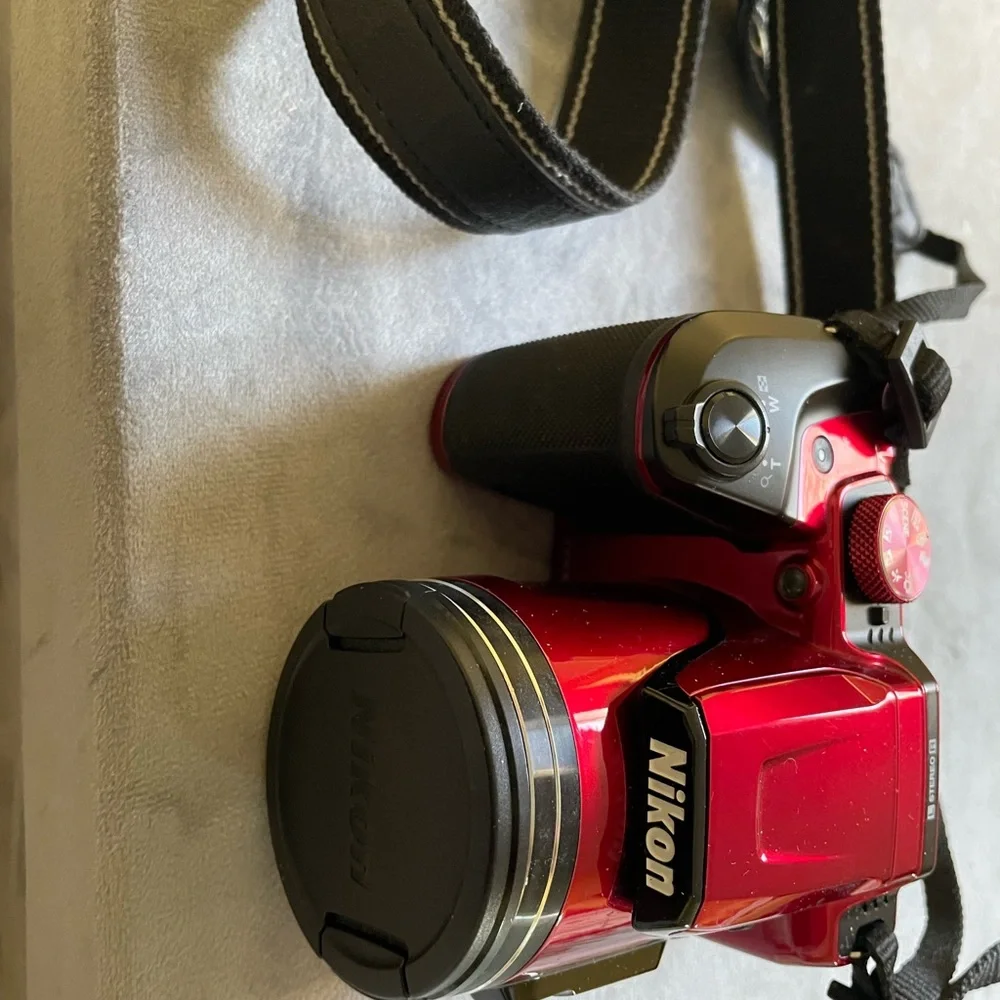 COPY - New Red Nikon camera with the bag.